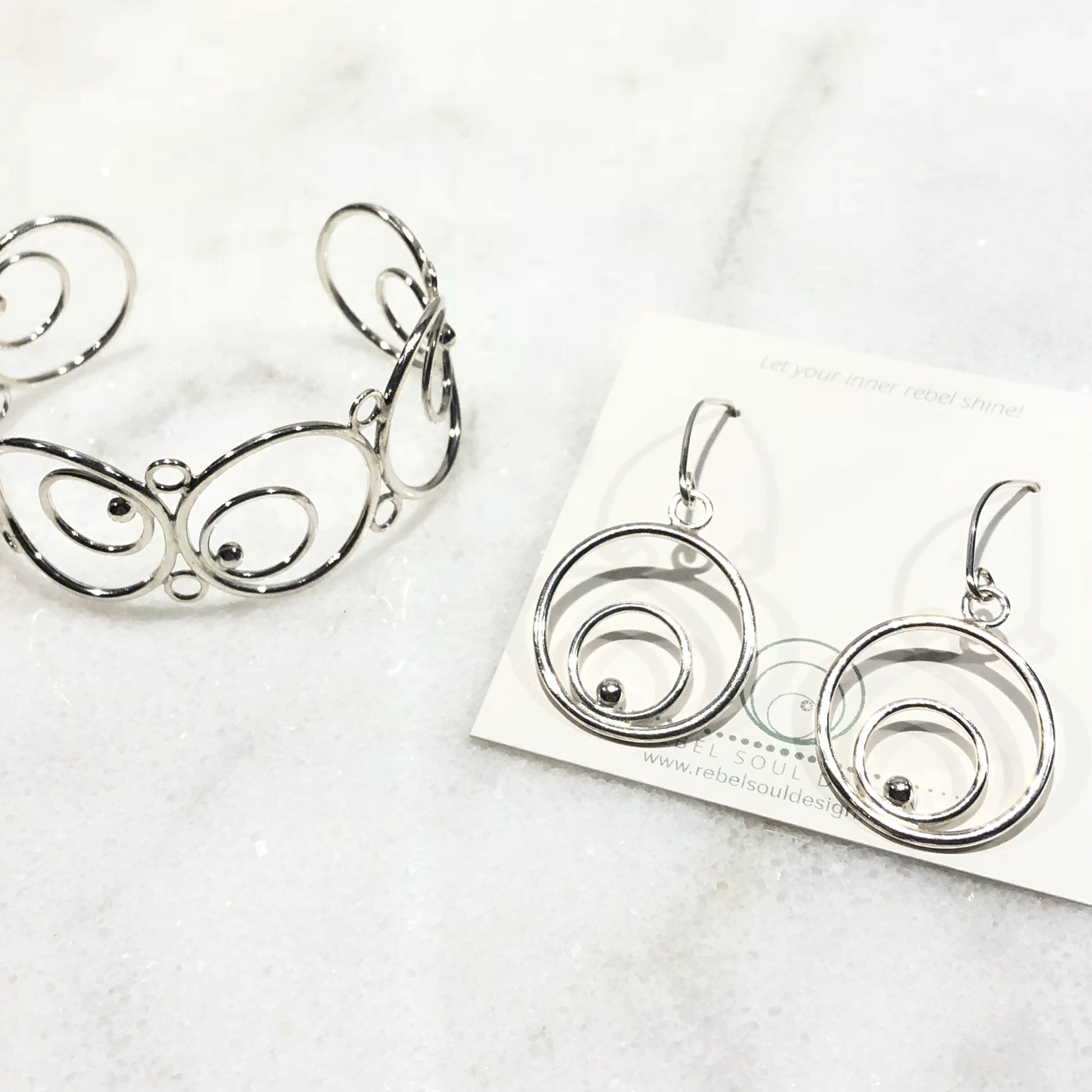 Silver circle drop earrings and matching bracelet