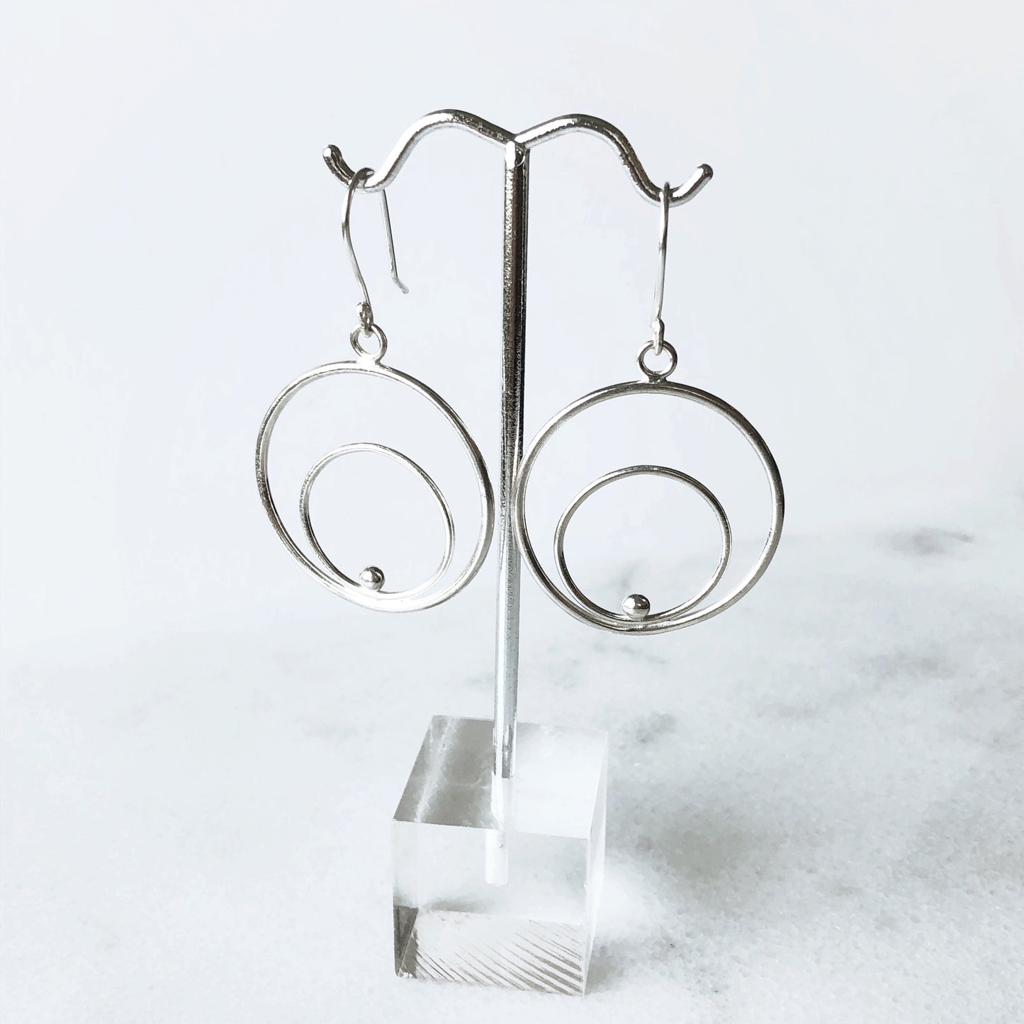 Astronomy inspired silver hoop earrings