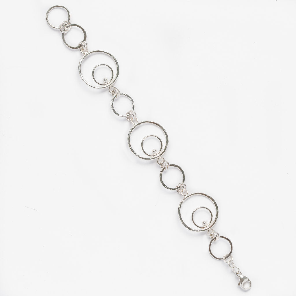 Orbital design silver link bracelet